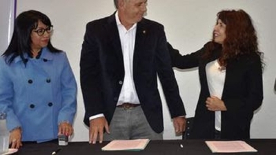 Firma de convenio para implementar men&uacute; en formatos accesibles